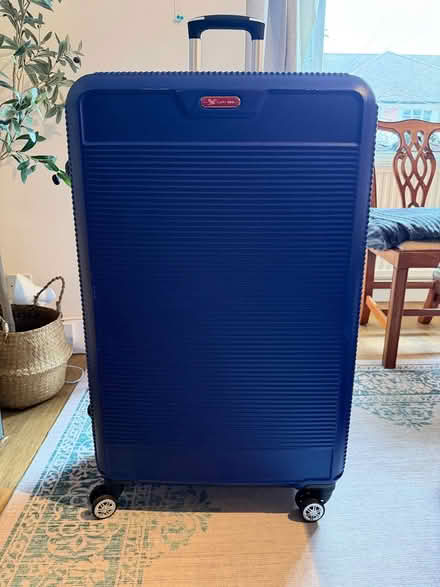 Photo of free Large suitcase (Wimbledon SW19) #1