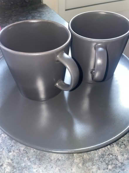 Photo of free 2 black cups and two flat black plates from ikea (Spotland Bridge OL12) #1
