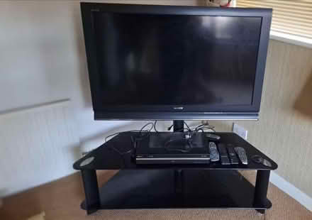 Photo of free Sony TV + glass stand (Stretford M32) #1