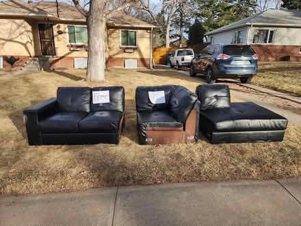Photo of free Black Leather Couch (Tufts & Galapago) #1
