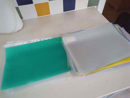 Photo of free Pile of plastic paper wallets and 'slippery fish' (Cutteslowe OX2) #1