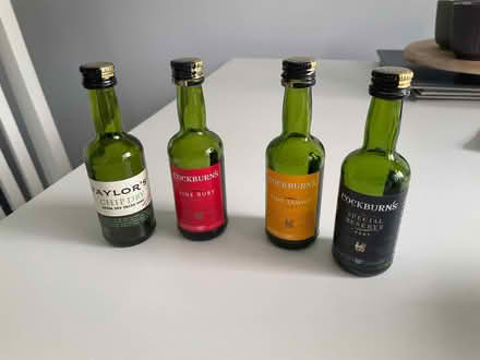 Photo of free 4 small port bottles and 3 tins (Longbarn WA2) #1