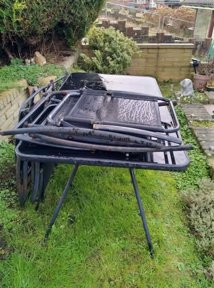 Photo of free Outdoor glass and black metal 6 place table, with 5 chairs. (Moulsecoomb BN2) #1