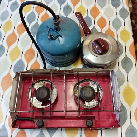 Photo of free Old twin burner camping stove, gas bottle and a pan (Marchmont EH9) #1