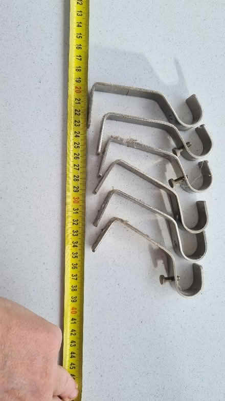 Photo of free 6 curtain rail brackets (Weston Park) #1