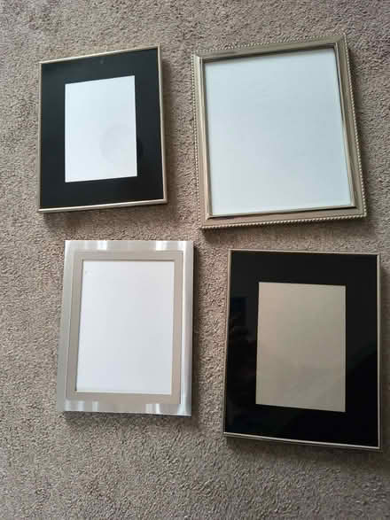 Photo of free 4 silver coloured photo frames (Hook KT9) #1