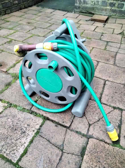 Photo of free Garden hose on a reel (Allerton L18) #1