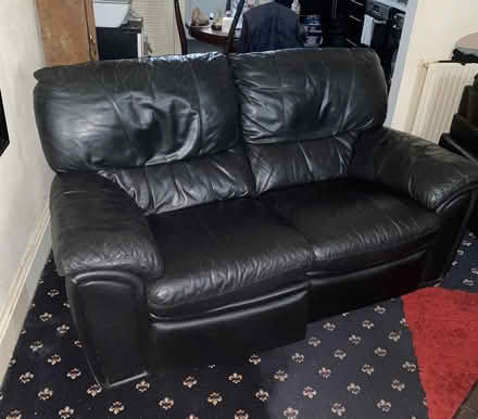 Photo of free Black leather two seater recliner (Harpurhey M40) #1