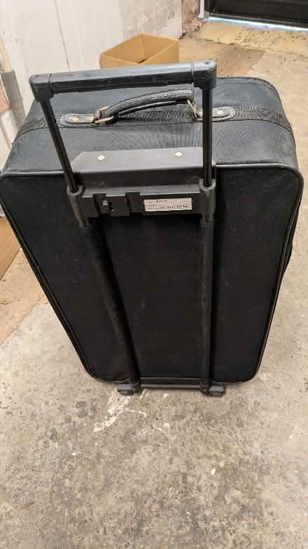 Photo of free Large canvas wheelie suitcase (Hersham KT12) #1