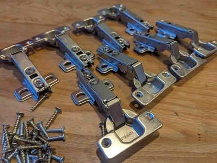 Photo of free Eight cabinet hinges and screws (Woodseats S8 0NW) #1