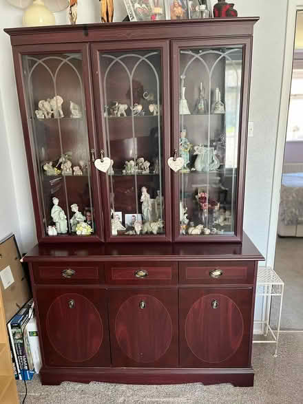 Photo of free Mahogany look display cabinet (West Horsham) #1