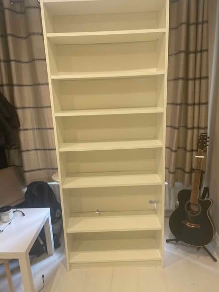 Photo of free Tall wood shelves (Leopardstown Dublin 18) #1