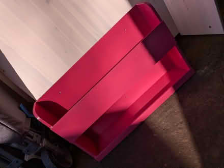 Photo of free Bright pink tidybooks book storage (Springfield CM1) #1