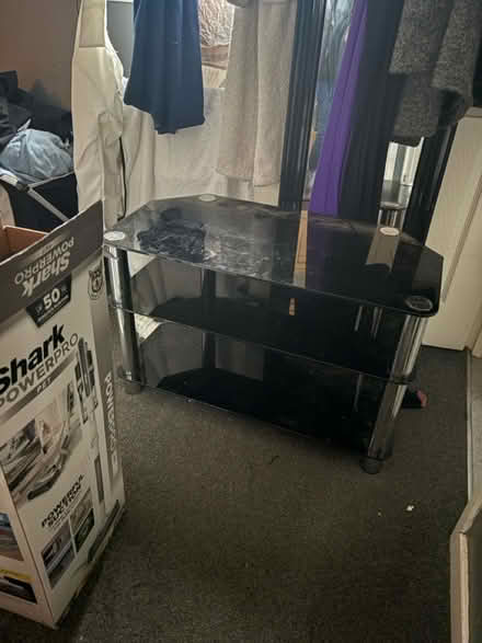 Photo of free Thick black glass TV Stand (Shelthorpe Avenue LE11) #1
