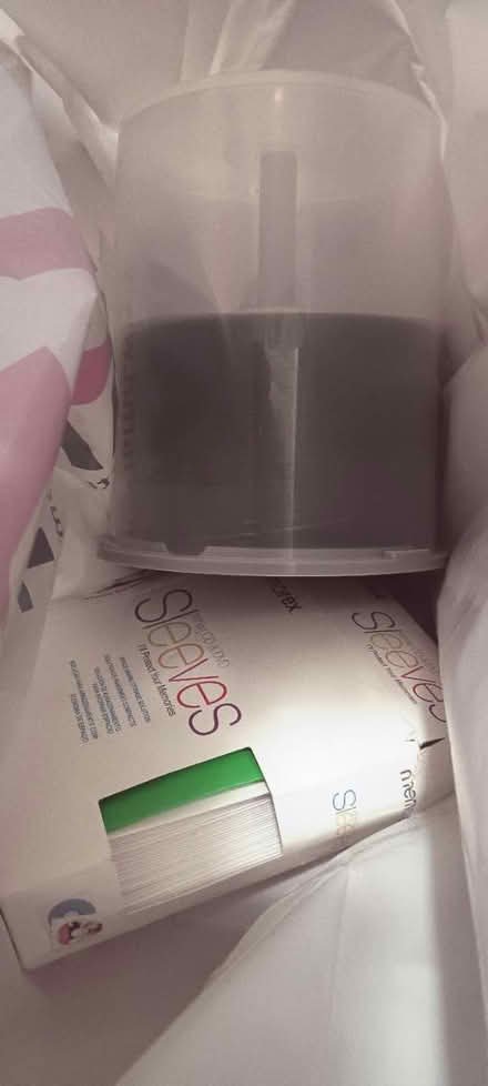 Photo of free Blank CD-Rs and sleeves (Maple Leaf) #1