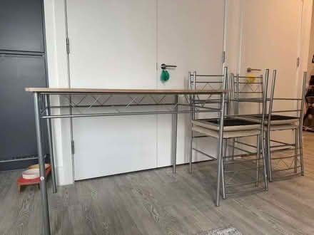 Photo of free Stylish dining table and four chairs (Plumstead SE18) #1