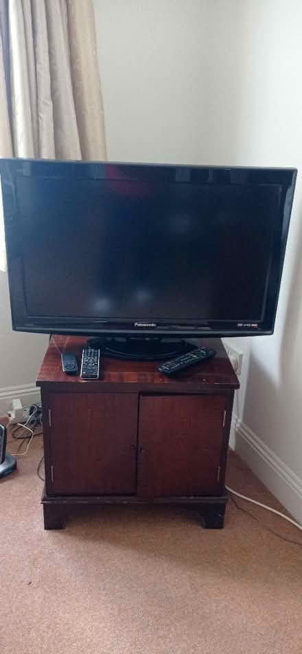 Photo of free Panasonic TV and cabinet (Petersfield) #1