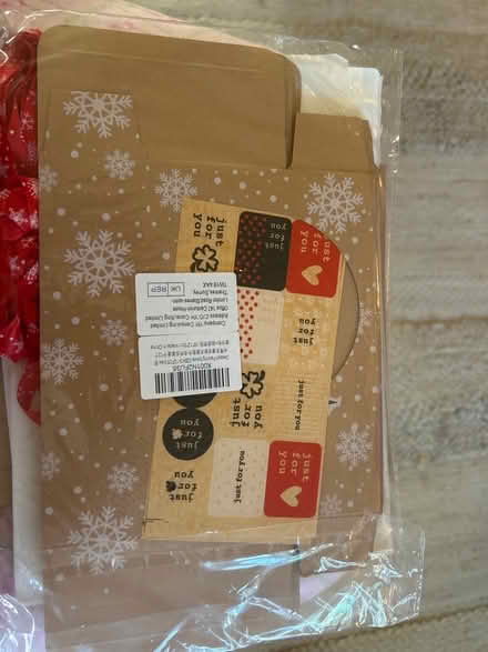 Photo of free Pack of small boxes and stickers for gifts (Mortlake SW13) #1