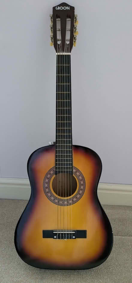 Photo of free Child's size toy guitar (Chippenham SN15) #1