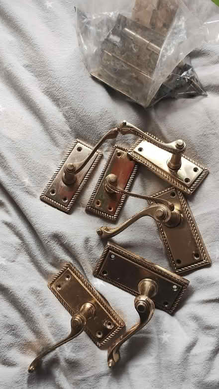 Photo of free Brass door handles plus regular one (DE24 Alvaston) #1