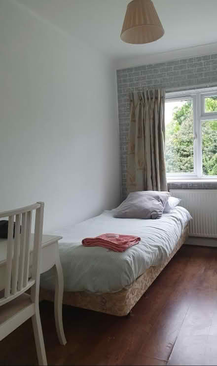 Photo of free Single Bed with wheels (WD25 Woodside) #1