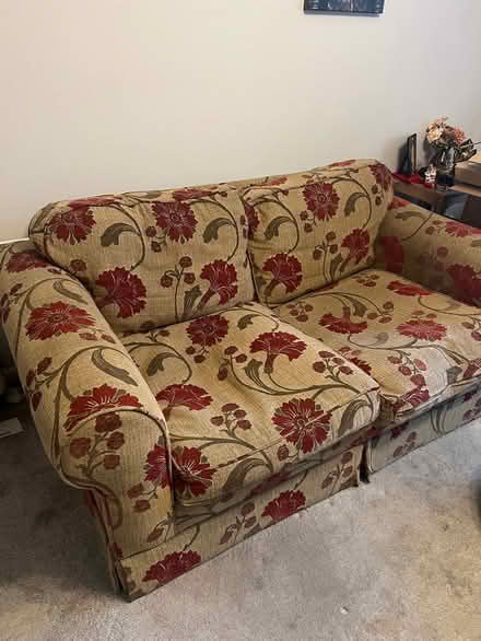 Photo of free Well loved 2 seater sofa (Biggleswade SG18) #1