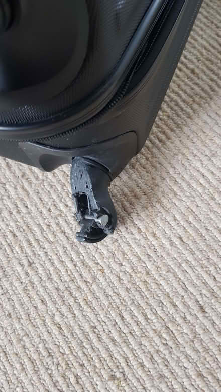 Photo of free Large black solid suitcase with broken wheel (Cheylesmore CV3) #2
