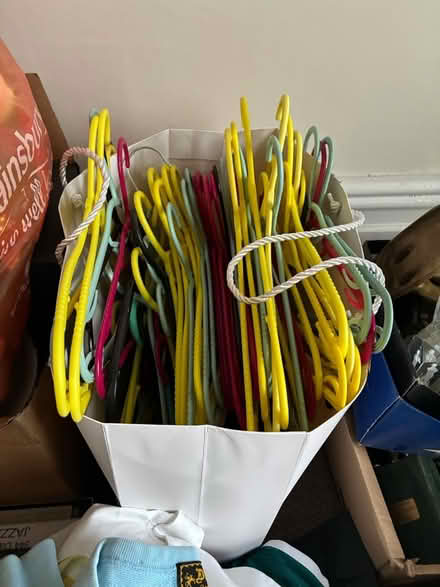 Photo of free approx 50 plastic coat hangers (Kingswood) #1