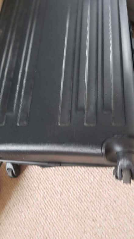 Photo of free Large black solid suitcase with broken wheel (Cheylesmore CV3) #1