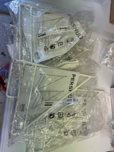 Photo of free 4 white metal shelf holdetd (Blaby LE8) #1