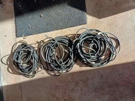 Photo of free About 30m black rubber covered flex (HR2 Llanwarne) #1