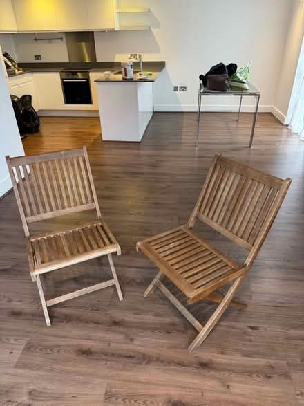 Photo of free Two wooden garden chairs (Wandsworth SW18) #1