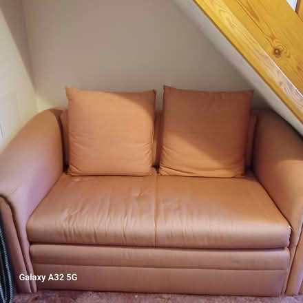 Photo of free 2 seater sofa bed (Worplesdon) #1