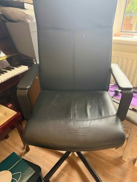 Photo of free black leatherette office chair (Urmston) #1
