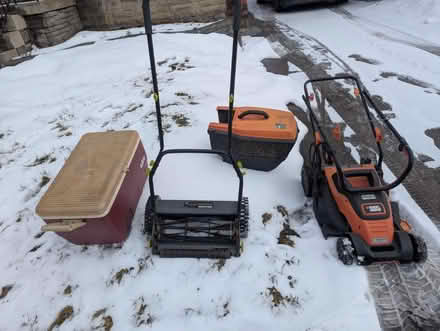 Photo of free Electric corded lawn mower. At curb (W2nd south of Fenell) #1
