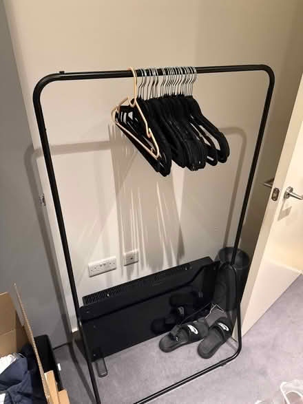 Photo of free Clothes rack with hangers (NW9) #1