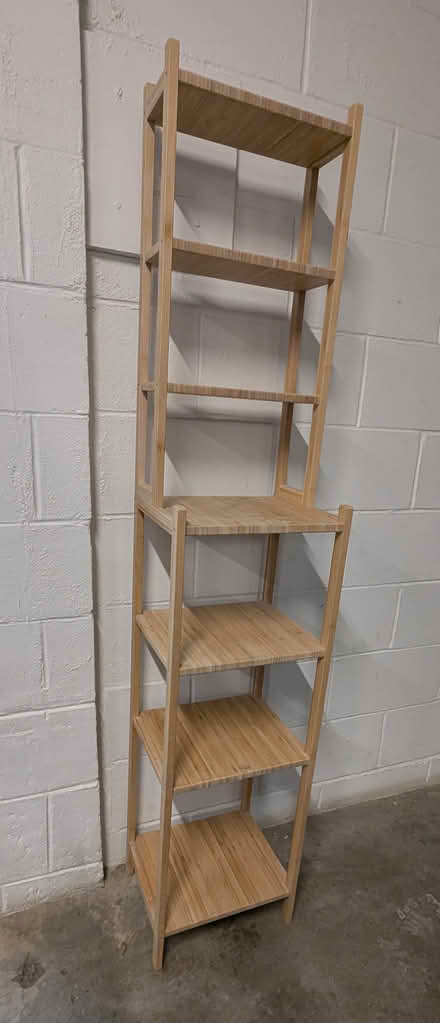 Photo of free Tall wood shelving unit (300 Witherspoon st, suite 201) #1