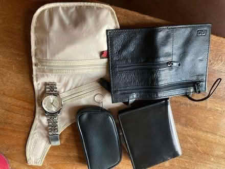Photo of free Travel wallets and a fake Omega watch (Poets MK40) #1