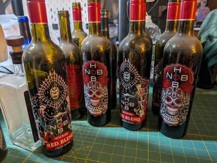Photo of free Skull & skeleton wine bottles (Denbigh) #1
