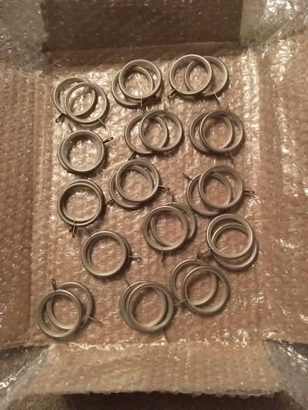 Photo of free Metal curtain rings x30 (Ibstock LE67) #1