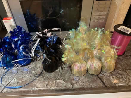 Photo of free Balloon weights various colours plus pink ribbon (Far Bletchley MK3) #1