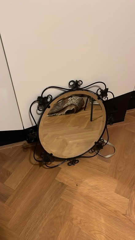 Photo of free 1960s bevelled circular mirror with decorative metal frame (Holland Park W11) #1