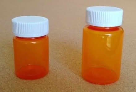 Photo of free Small translucent pill bottles #1