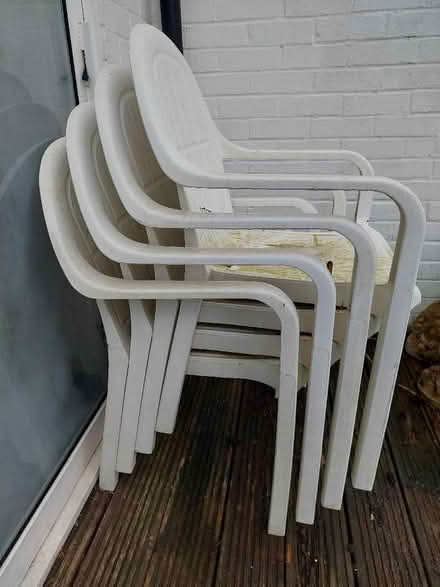 Photo of free White plastic garden chairs (Seaford BN25) #3