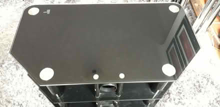 Photo of free Black glass TV stand (Kilburn DE56) #2