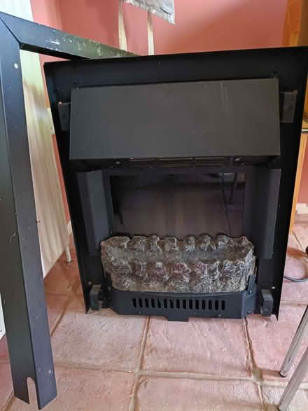 Photo of free Electric fireplace with mantel and stone hearth (Bungay NR35) #1