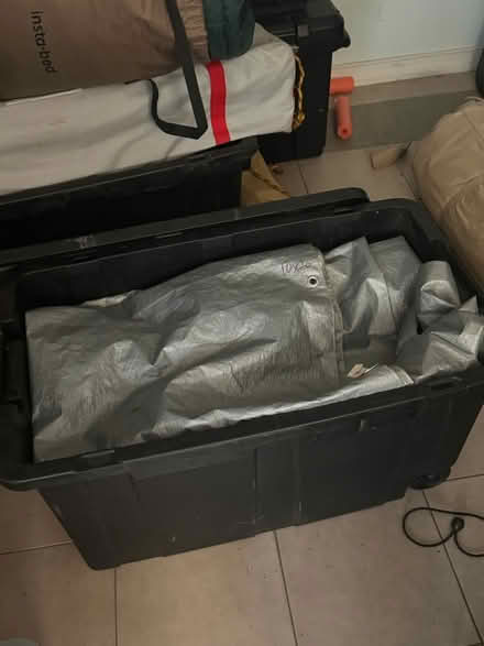 Photo of free Bin of tarps (SouthEast Austin) #1