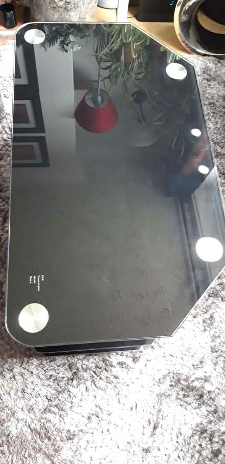 Photo of free Black glass TV stand (Kilburn DE56) #1