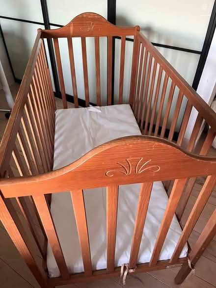 Photo of free Baby cot with mat (Woking GU21) #2