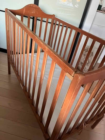 Photo of free Baby cot with mat (Woking GU21) #1